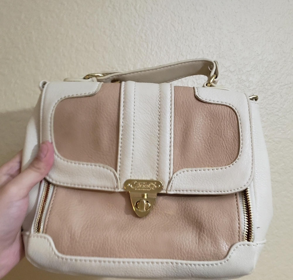 Carlos by carlos santana Beige handbag with red interior.